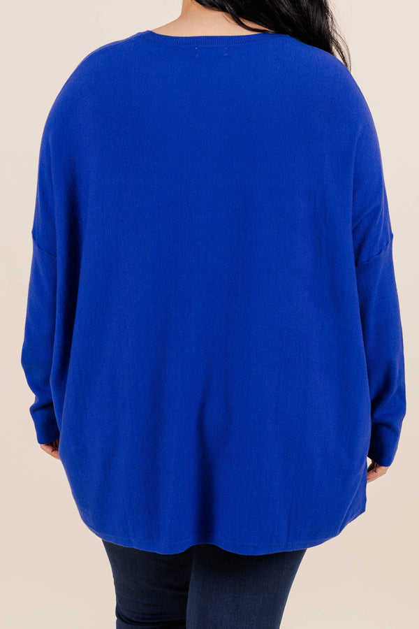 Chic Soul plus size clothing, cobalt blue long sleeve top with front pockets on the bottom