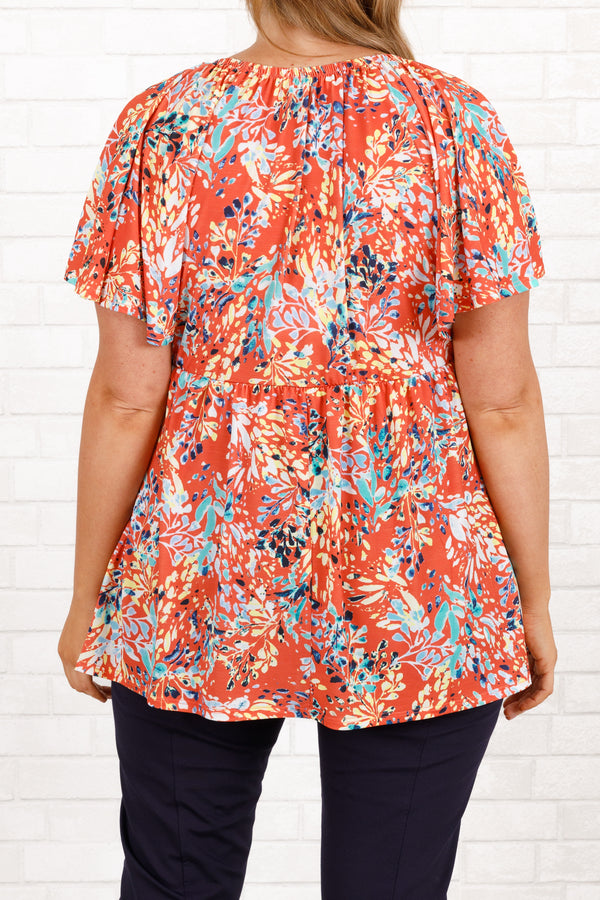 Chic Soul plus size clothing, coral floral pattern babydoll top with a knotted neckline and flowy sleeves
