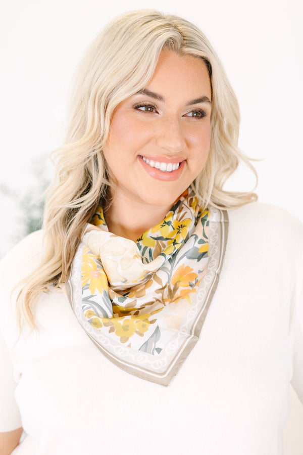 Plus Size floral scarf in brown and yellow with a soft drape and decorative border.