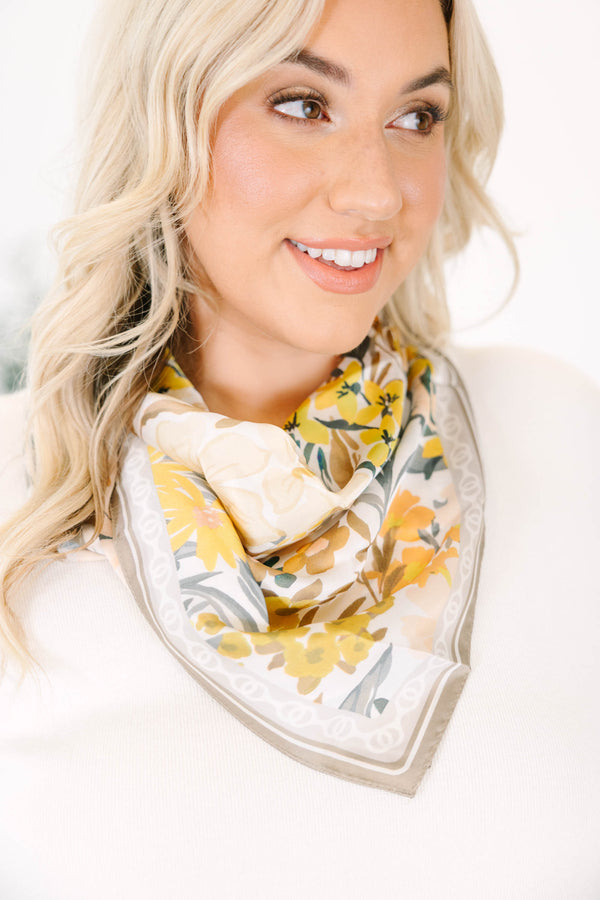 Plus Size floral scarf in brown and yellow with a soft drape and decorative border.