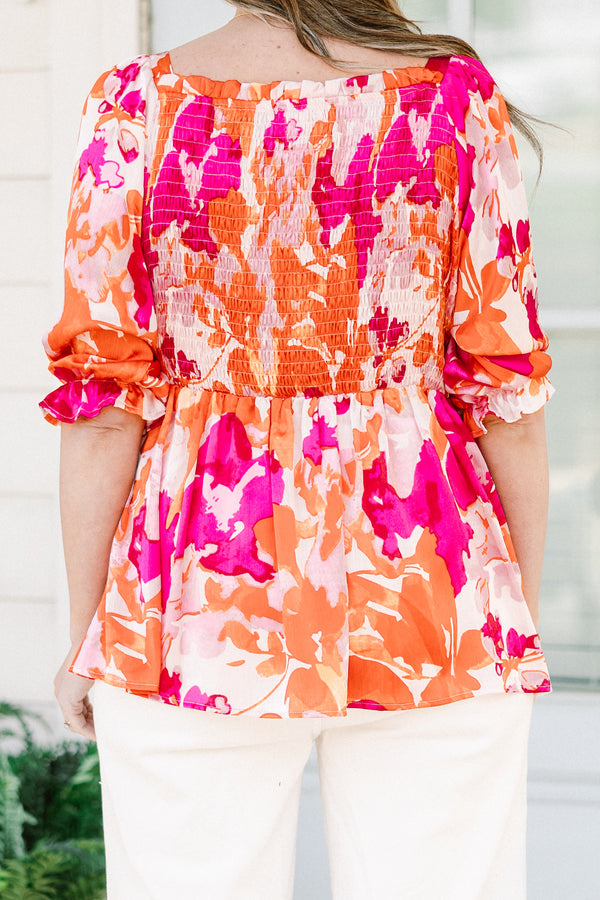 Chic Soul plus size clothing, pink/orange multi floral print peplum top with smocked chest detail with square neckline and puff sleeves with ruffle detail