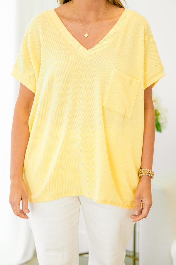 Chic Soul plus size clothing, short-sleeve butter yellow top with a v-neckline and a pocket on the bodice 
