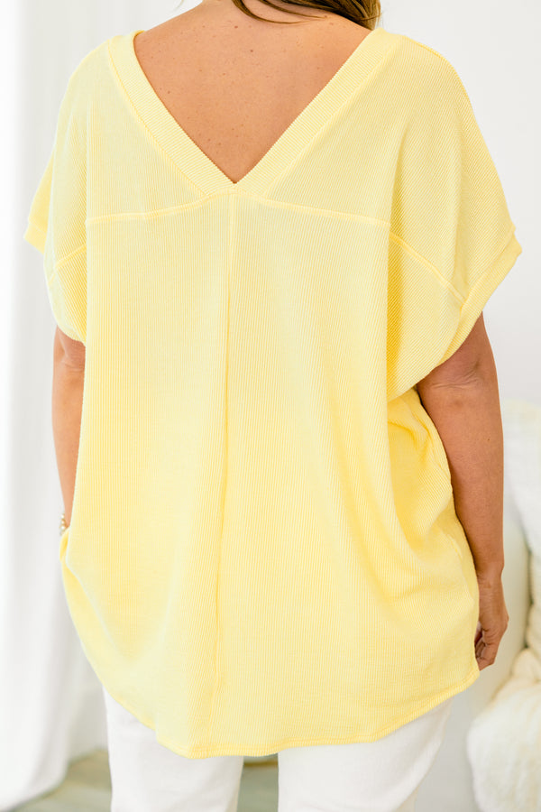 Chic Soul plus size clothing, short-sleeve butter yellow top with a v-neckline and a pocket on the bodice 