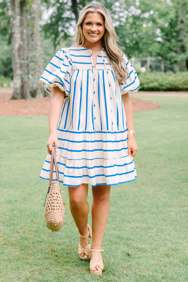 Plus Size blue and white striped cotton dress with smocked split neck and puff sleeves.