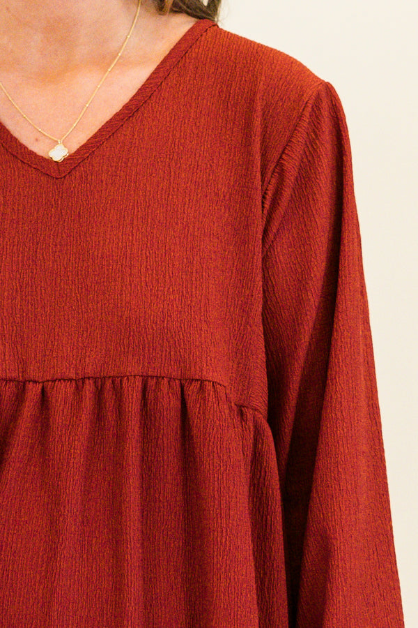 bubble-long-sleeve cinnamon rust red ruffled baby doll dress with v-neckline 
