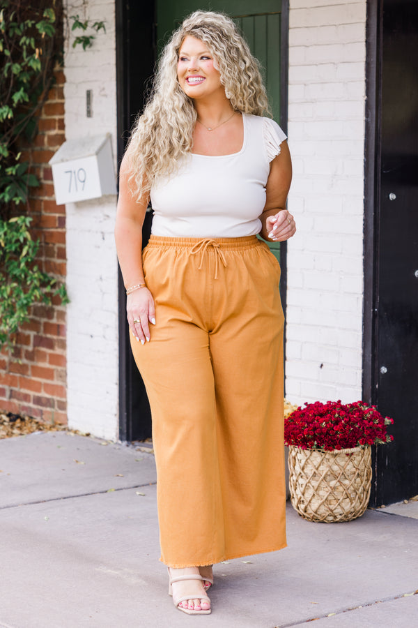 Chic Soul plus size clothing, high-waisted light orange wide leg pants with elastic waistband and tie with distressed seams 