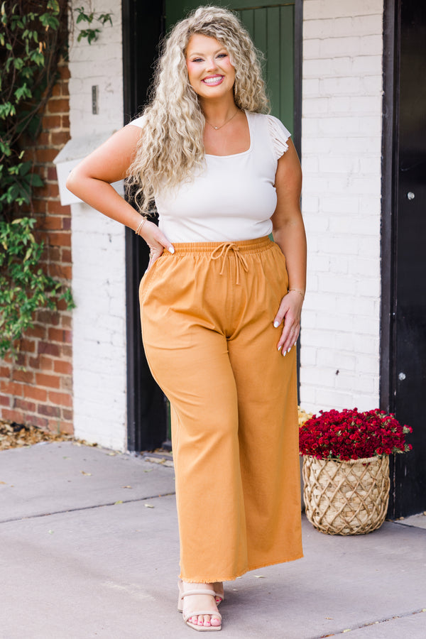 Chic Soul plus size clothing, high-waisted light orange wide leg pants with elastic waistband and tie with distressed seams 