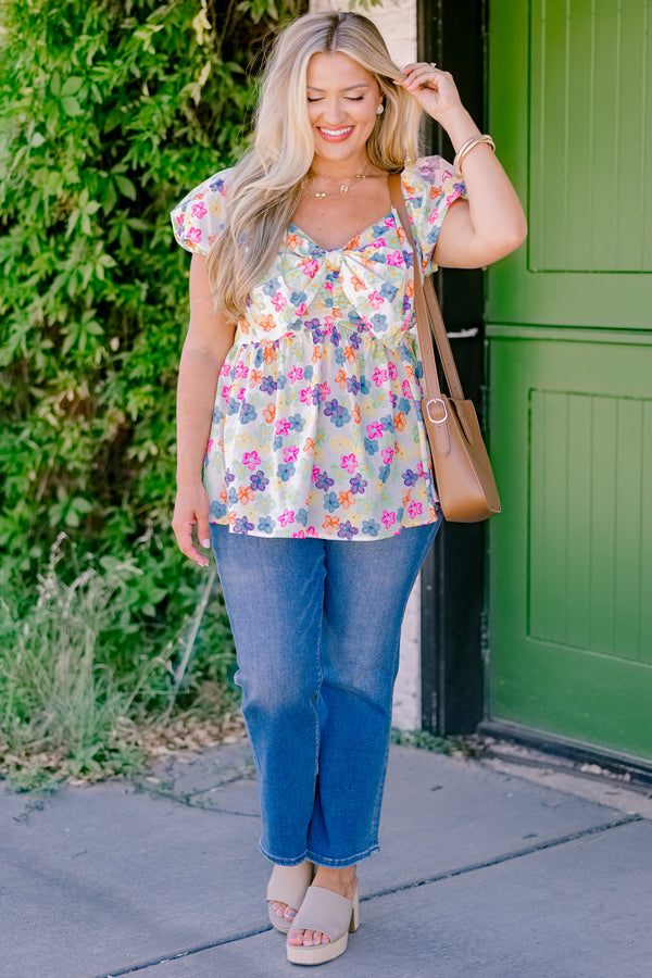 Chic Soul plus size clothing, ivory short-bubble sleeve sweetheart neckline casual top with multi-colored flower pattern and large bow detail near neckline