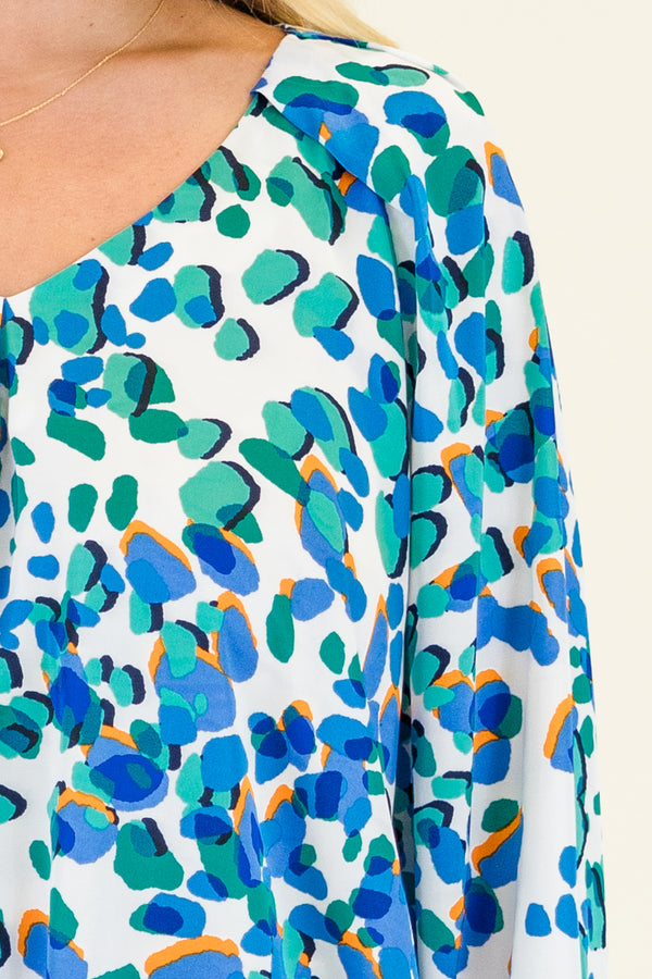 Chic Soul plus size clothing, long-sleeve blue abstract leopard print blouse with a subtle v-neckline