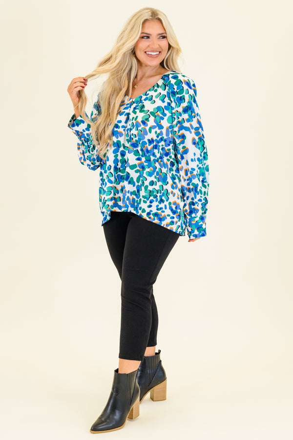 Chic Soul plus size clothing, long-sleeve blue abstract leopard print blouse with a subtle v-neckline