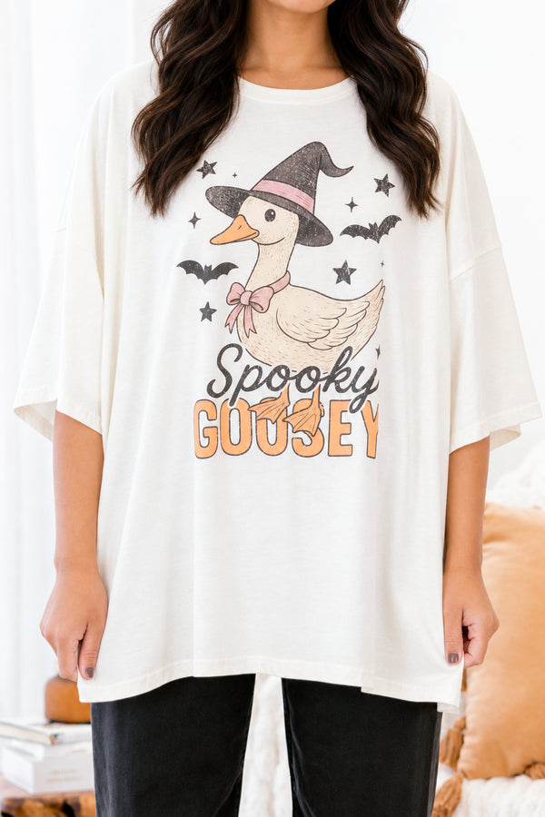 Chic Soul Plus size clothing, ivory graphic tee that has a cartoon goose with a witch hat and bats graphic in the middle of the shirt