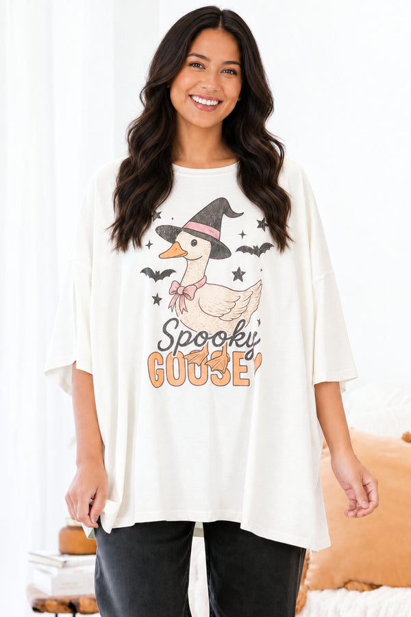 Chic Soul Plus size clothing, ivory graphic tee that has a cartoon goose with a witch hat and bats graphic in the middle of the shirt