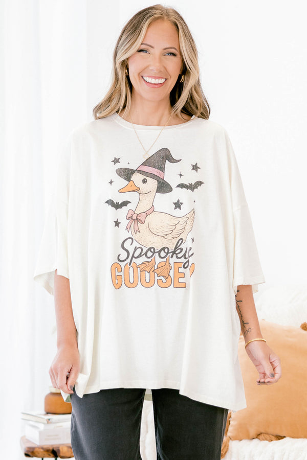 Chic Soul Plus size clothing, ivory graphic tee that has a cartoon goose with a witch hat and bats graphic in the middle of the shirt