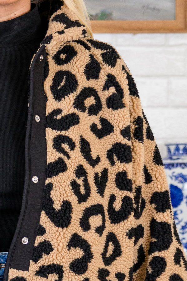 Plus Size leopard print sherpa coat in tan and black with a snap-front closure and black trim.