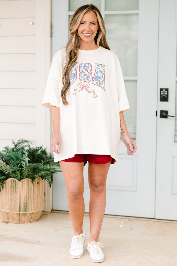 Chic Soul plus size clothing, short-sleeve ivory white drop-shoulder boyfriend tee with a red white and blue graphic lettering stating 