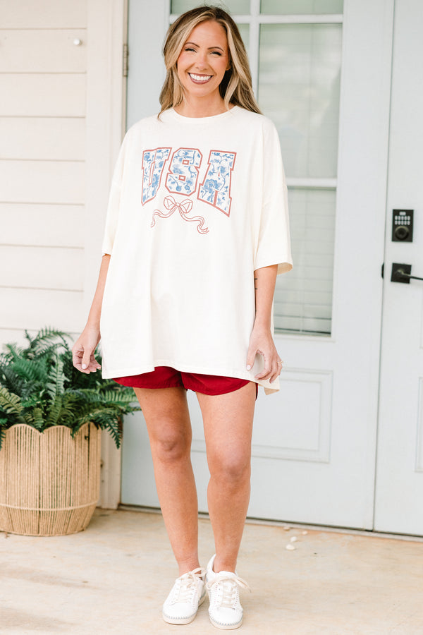 Chic Soul plus size clothing, short-sleeve ivory white drop-shoulder boyfriend tee with a red white and blue graphic lettering stating 