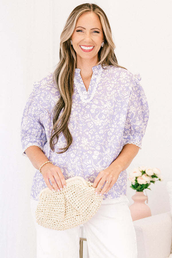 Chic soul plus size clothing, purple blouse with a white floral pattern and bubble sleeves 