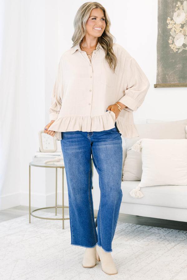 Plus Size dark wash straight leg jeans with a high waist and raw fringe hems.