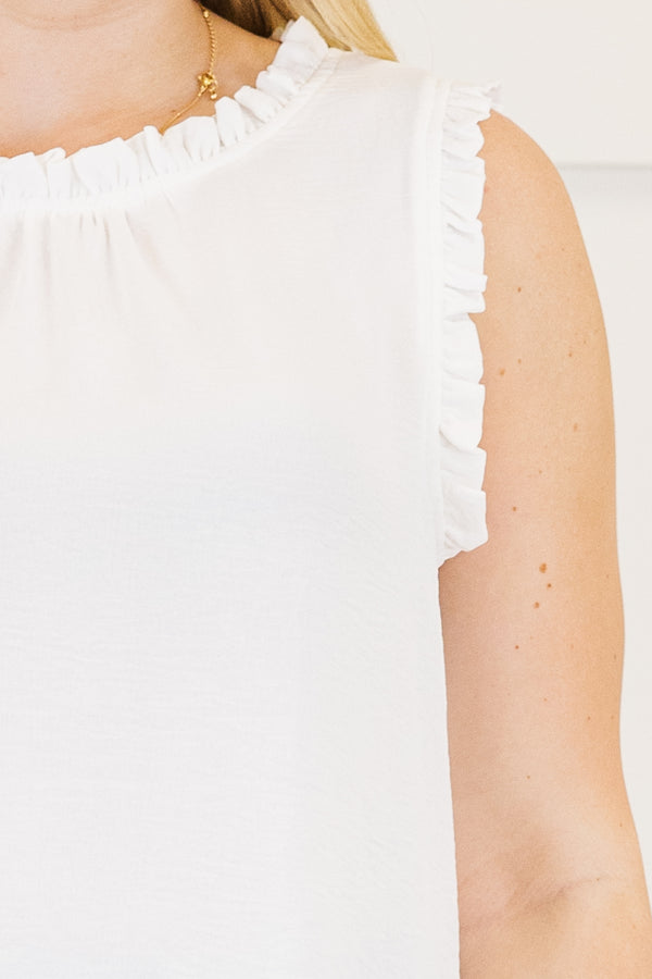 Plus Size ivory sleeveless top with a ruffled high neckline and matching ruffle trim at the armholes.