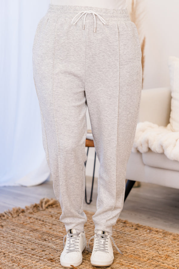 Chic Soul plus size clothing, high-waisted heather grey comfy joggers with inside-out stitching detailing and elastic waistband with white waist-tie