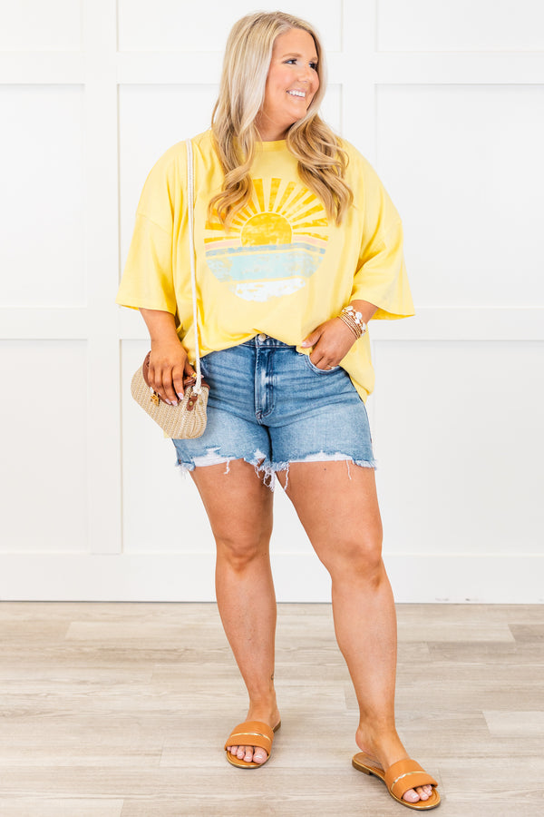 Plus Size butter yellow oversized boyfriend tee with a sunset graphic and crew neckline.