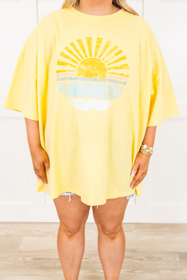 Plus Size butter yellow oversized boyfriend tee with a sunset graphic and crew neckline.