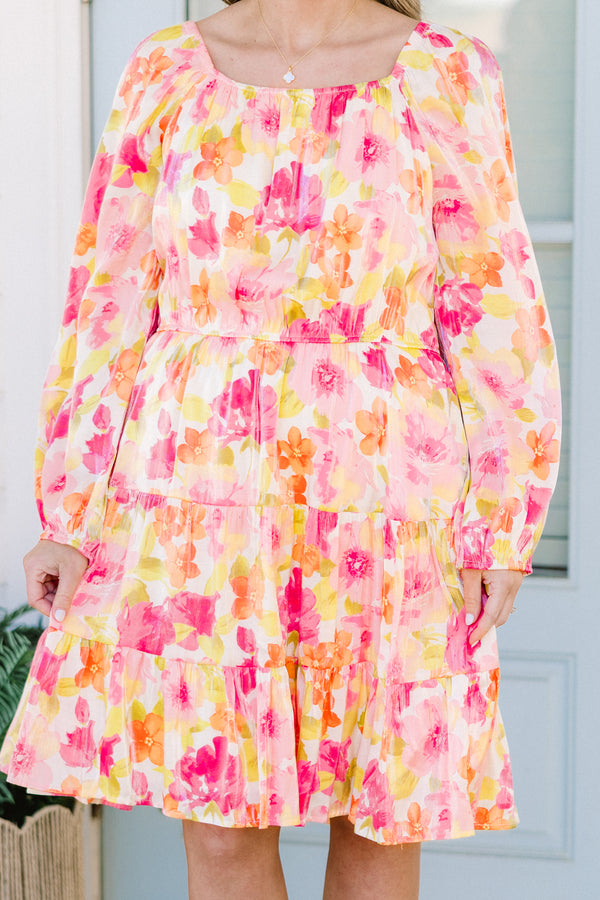 Plus Size pink floral square neck dress with long peasant sleeves and a tiered skirt.