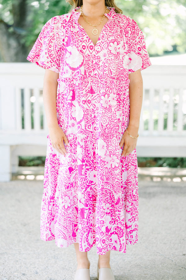 Plus size fuchsia and white floral print midi dress with a flowy tiered silhouette and V-neckline.