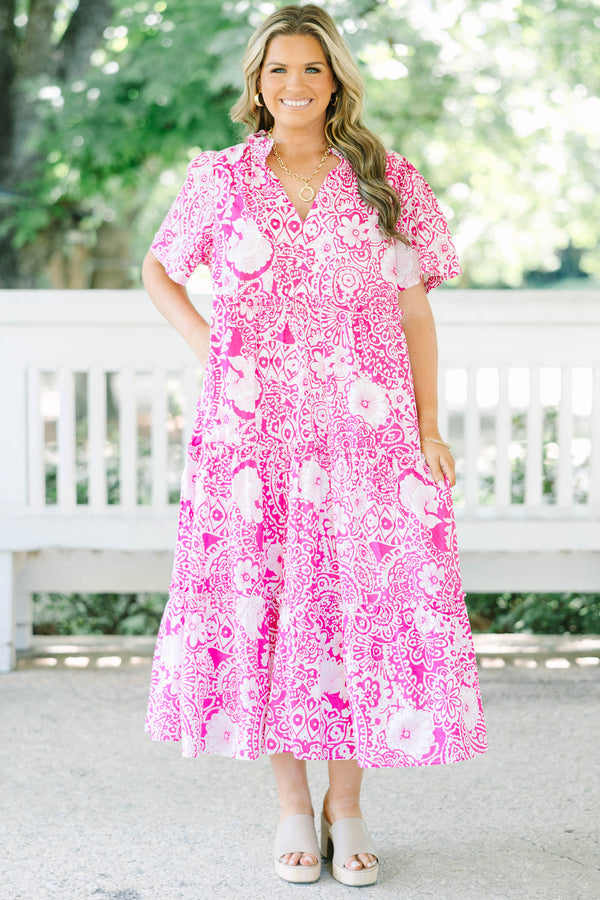 Plus size fuchsia and white floral print midi dress with a flowy tiered silhouette and V-neckline.