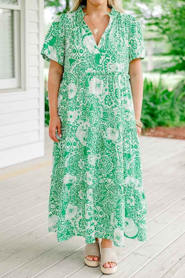 Chic Soul Plus size clothing, green maxi dress with a white floral pattern slight v-neckline and short sleeves 

