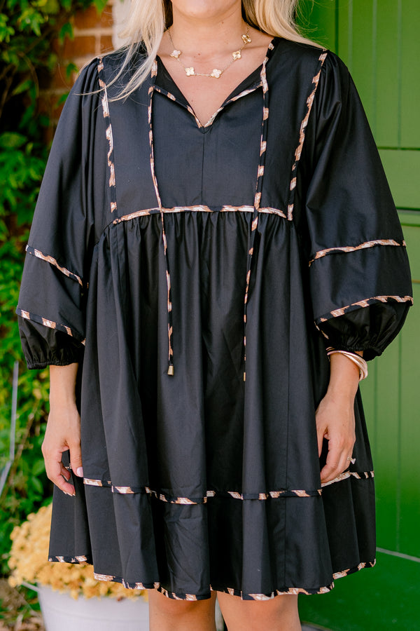 Chic Soul plus size clothing, black dress with long bubble sleeves and cheetah print stitching details on the tiers of the dress sleeves and neckline 