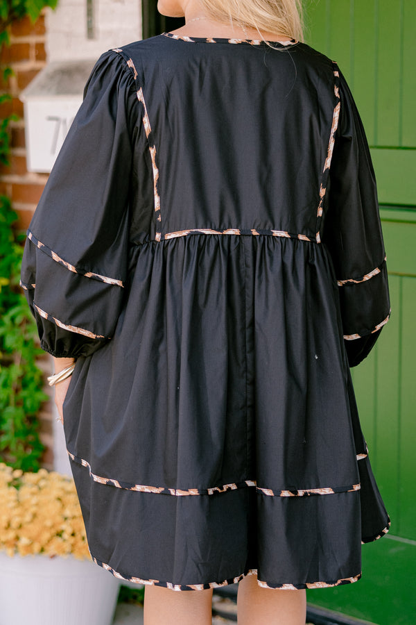 Chic Soul plus size clothing, black dress with long bubble sleeves and cheetah print stitching details on the tiers of the dress sleeves and neckline 