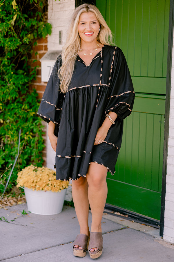Chic Soul plus size clothing, black dress with long bubble sleeves and cheetah print stitching details on the tiers of the dress sleeves and neckline 