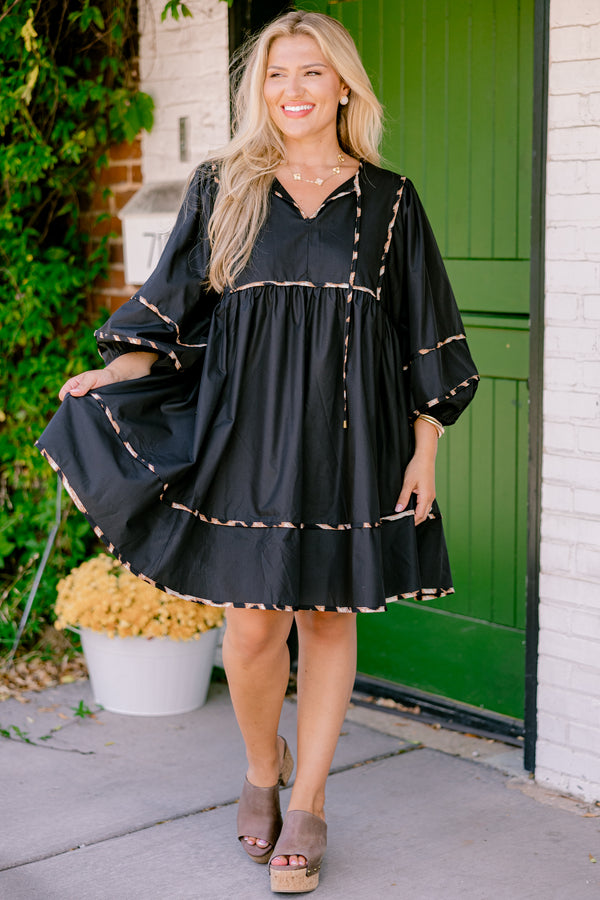 Chic Soul plus size clothing, black dress with long bubble sleeves and cheetah print stitching details on the tiers of the dress sleeves and neckline 