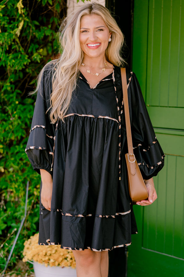 Chic Soul plus size clothing, black dress with long bubble sleeves and cheetah print stitching details on the tiers of the dress sleeves and neckline 