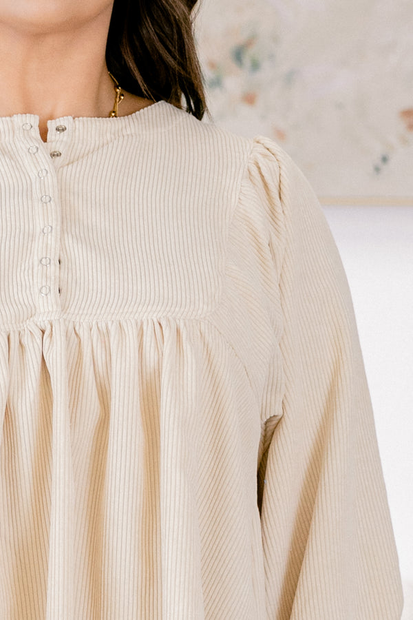 Chic Soul plus size clothing, ivory top with long bubble sleeves and buttons going down to the chest