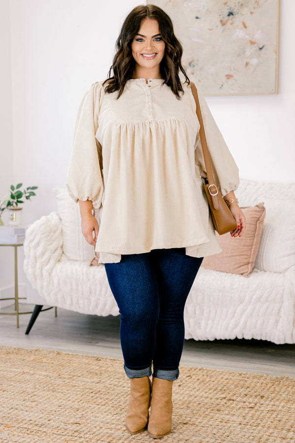 Chic Soul plus size clothing, ivory top with long bubble sleeves and buttons going down to the chest