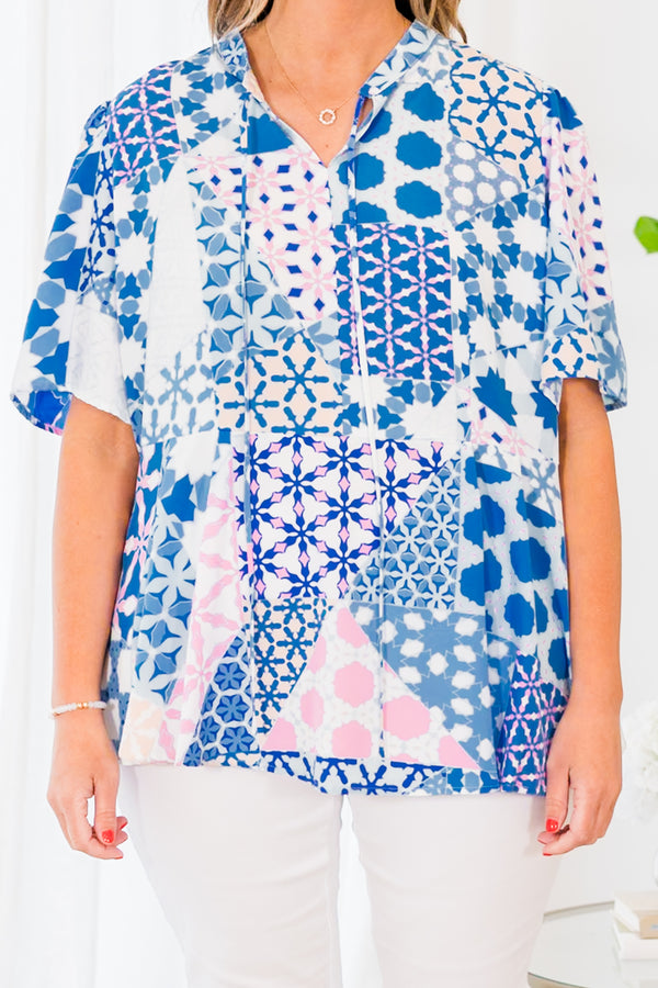 Chic Soul plus size clothing, blue top with different geometric pattern and a necktie