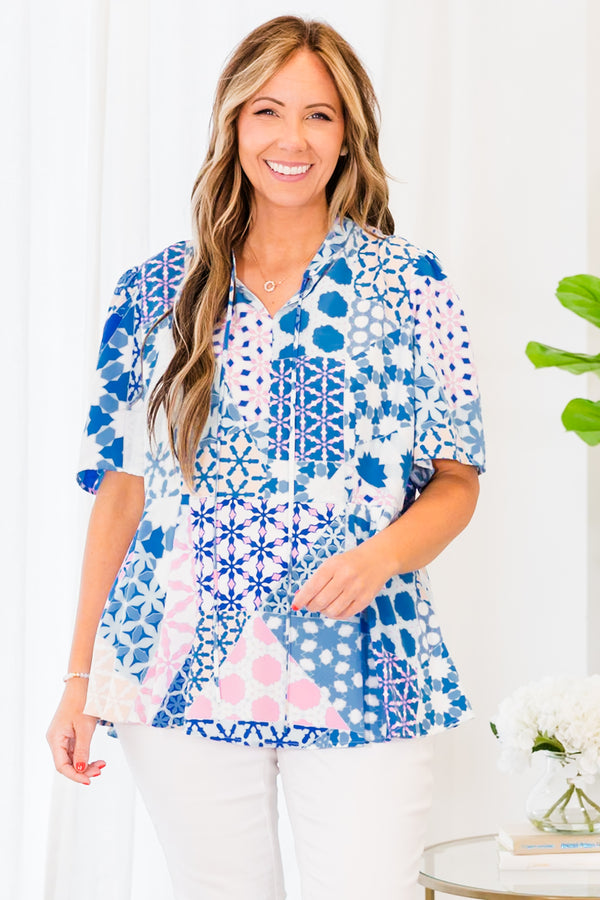 Chic Soul plus size clothing, blue top with different geometric pattern and a necktie