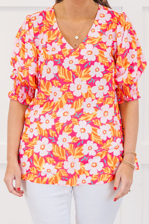 Chic Soul plus size clothing, hot pink short sleeve top with v neckline and smocked cuff sleeves with large multi floral print