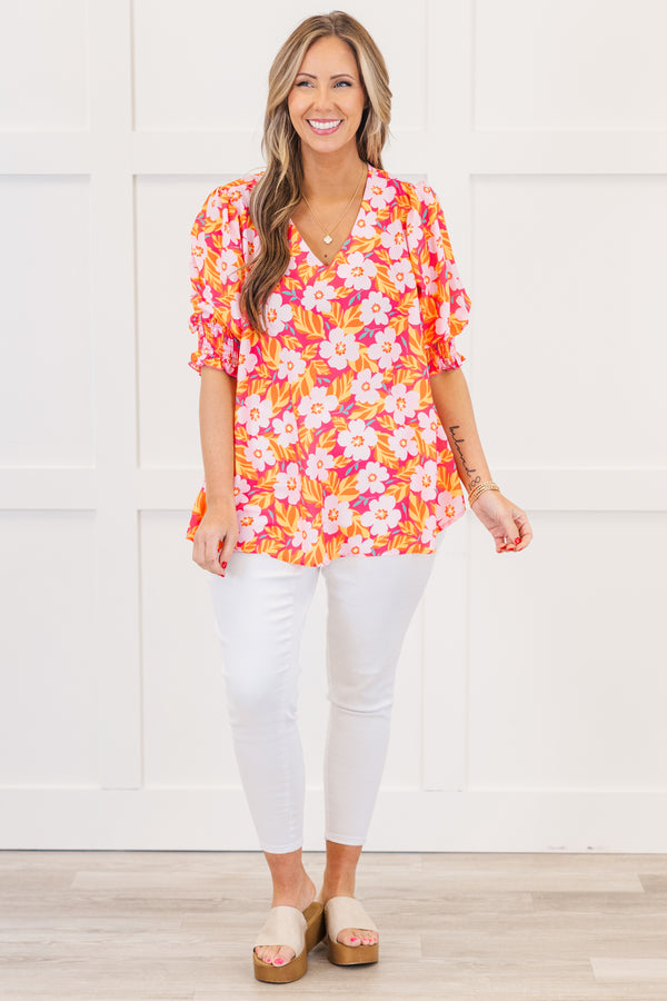Chic Soul plus size clothing, hot pink short sleeve top with v neckline and smocked cuff sleeves with large multi floral print