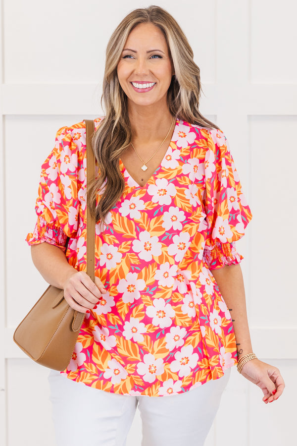 Chic Soul plus size clothing, hot pink short sleeve top with v neckline and smocked cuff sleeves with large multi floral print