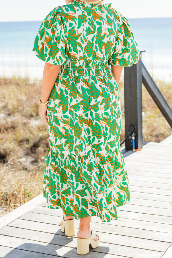 Chic Soul plus size clothing, short-puffed-sleeve green maxi dress with a scoop-neckline and smocked detailing on the waistline with a green and white tropical floral pattern 