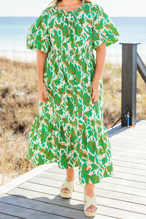 Chic Soul plus size clothing, short-puffed-sleeve green maxi dress with a scoop-neckline and smocked detailing on the waistline with a green and white tropical floral pattern 