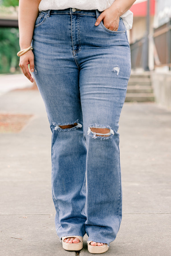 Chic Soul plus size clothing, high rise medium wash denim flare jeans with holes and light distressing on the knee