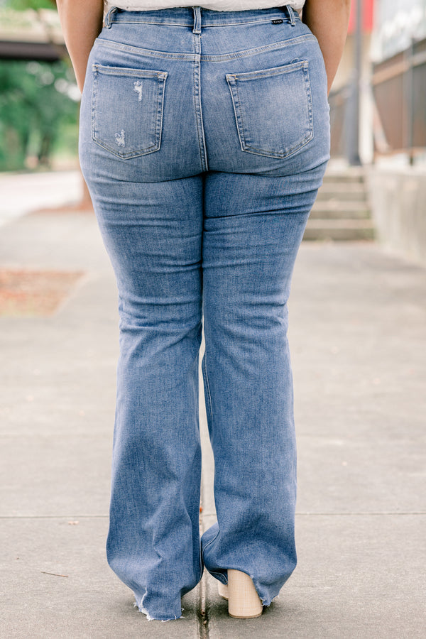 Chic Soul plus size clothing, high rise medium wash denim flare jeans with holes and light distressing on the knee