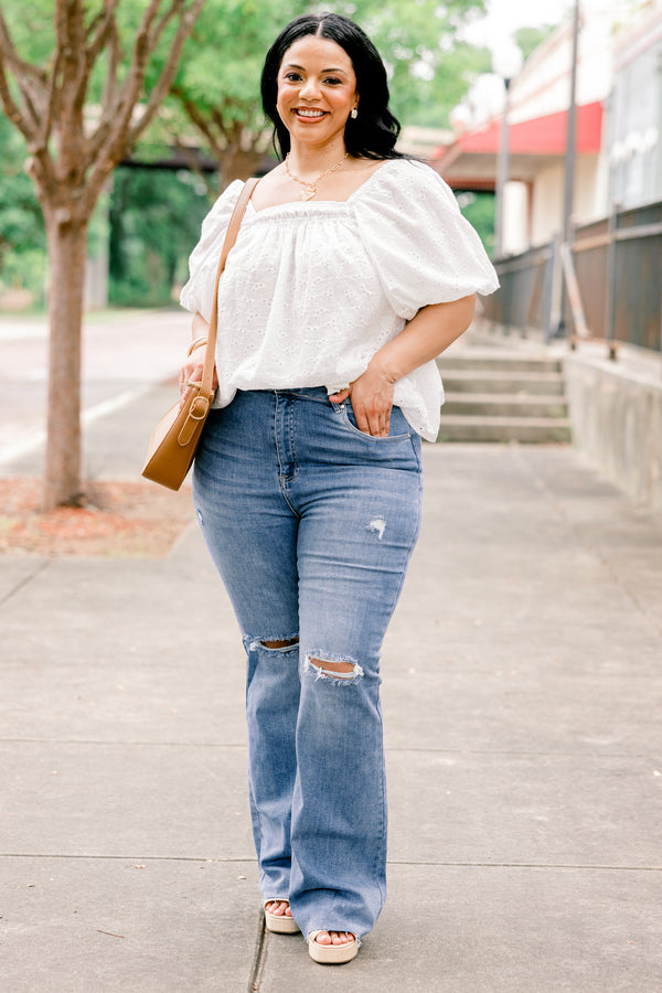Chic Soul plus size clothing, high rise medium wash denim flare jeans with holes and light distressing on the knee