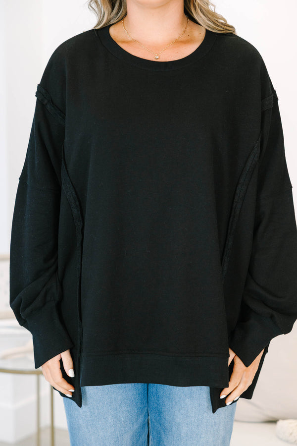 Plus size Sunset Glow Pullover in black, featuring a relaxed fit, crew neck, and raw seam details.