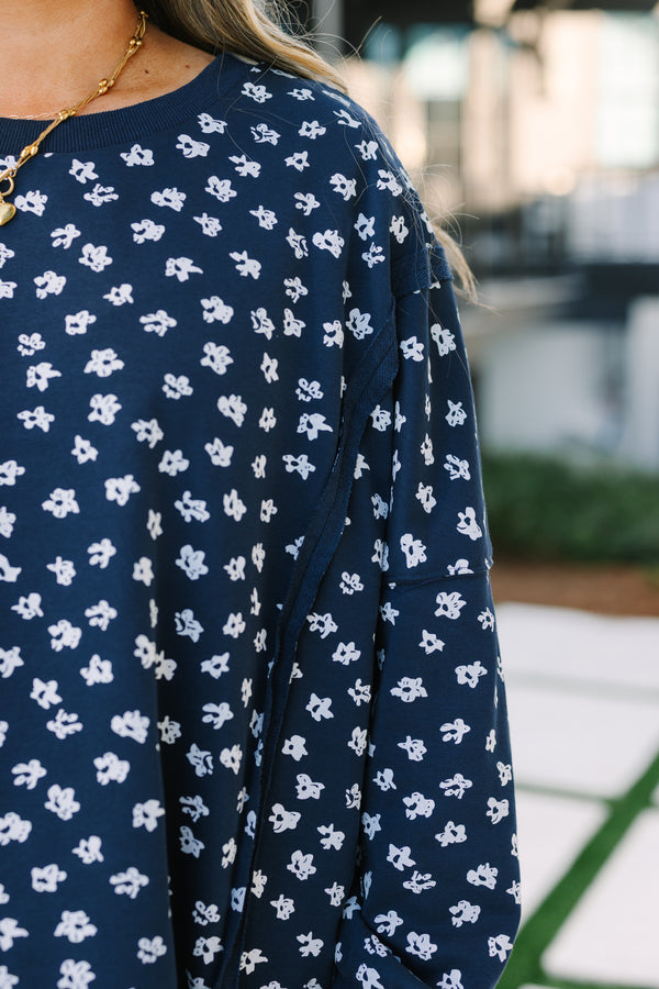 Chic Soul plus size clothing, navy and white floral print long sleeve crewneck oversized pullover with slits on the hip
