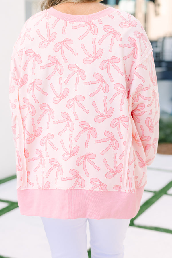 Chic Soul plus size clothing, pink ribbon pullover with side slits and exposed seams